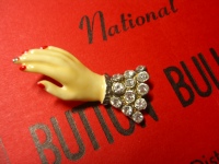 Lolita Lempicka "hand" button with rhinestone cuff, inscribed on back
